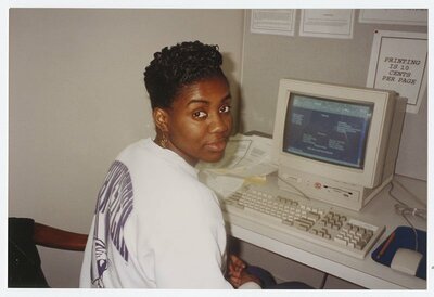 Photograph of a woman using a computer at the Athens-Clarke County Library, Athens, Georgia, circa 1995